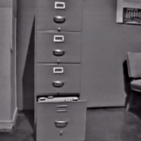 nonprofit systems - gif of giant file cabinet drawer opening toward the viewer